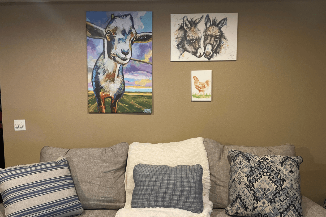 farmhouse animal art prints above couch