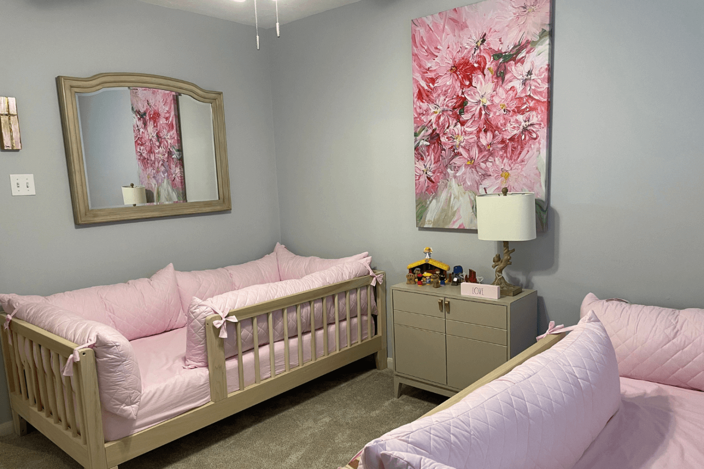pink flower art in bedroom