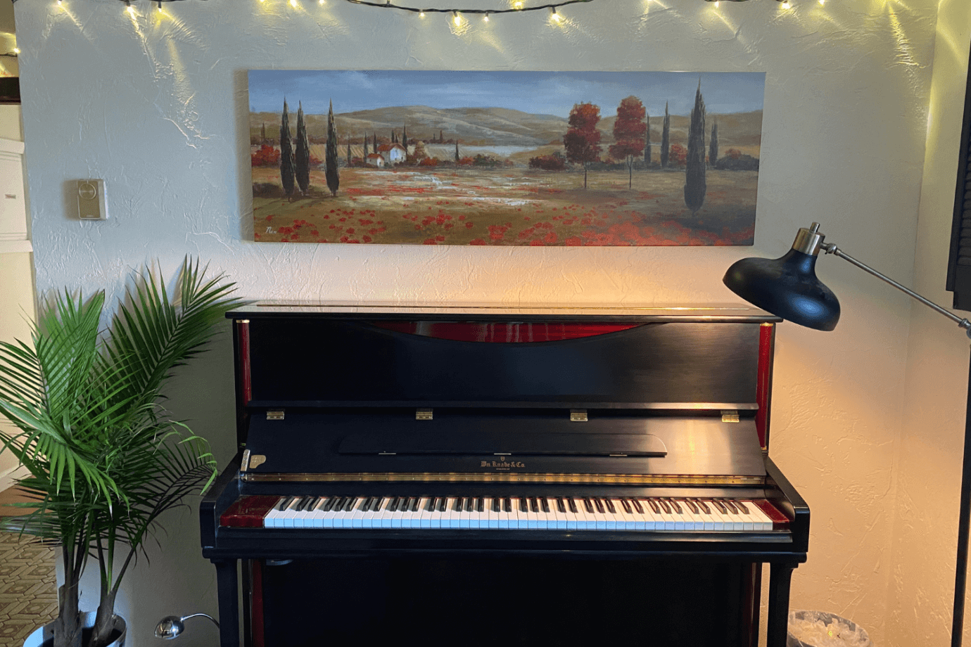 panoramic landscape art above piano