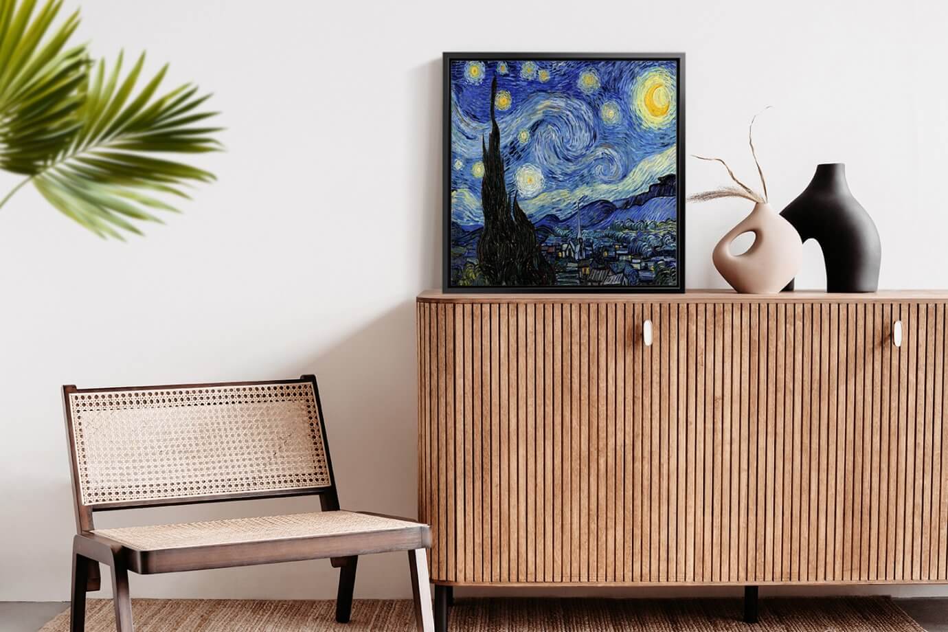 the starry night painting displayed in a room