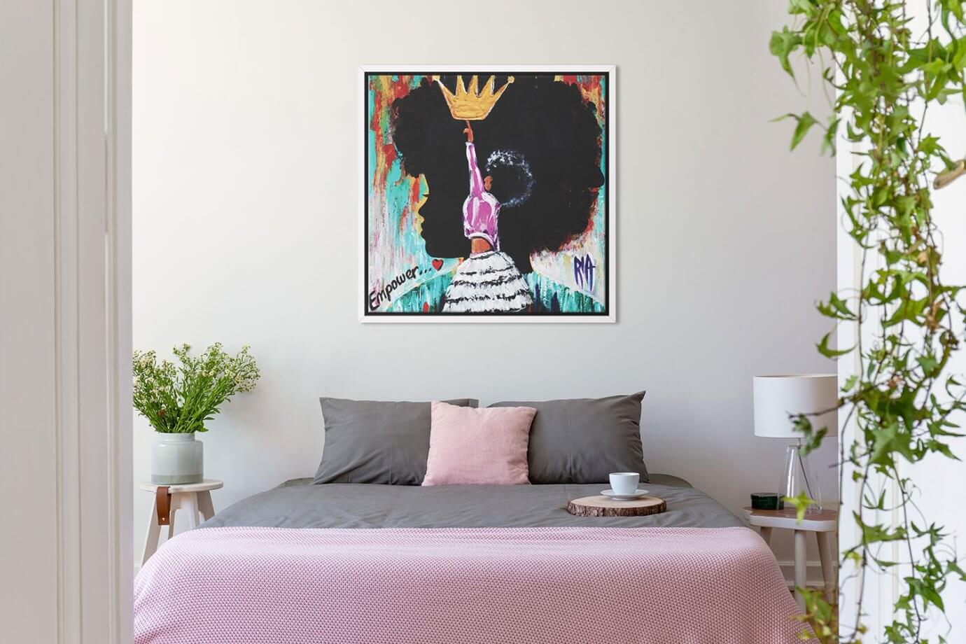 women's empowerment art over bed