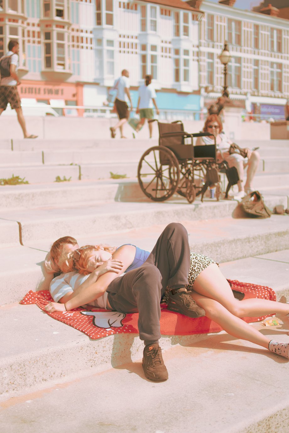 couple resting on stairs