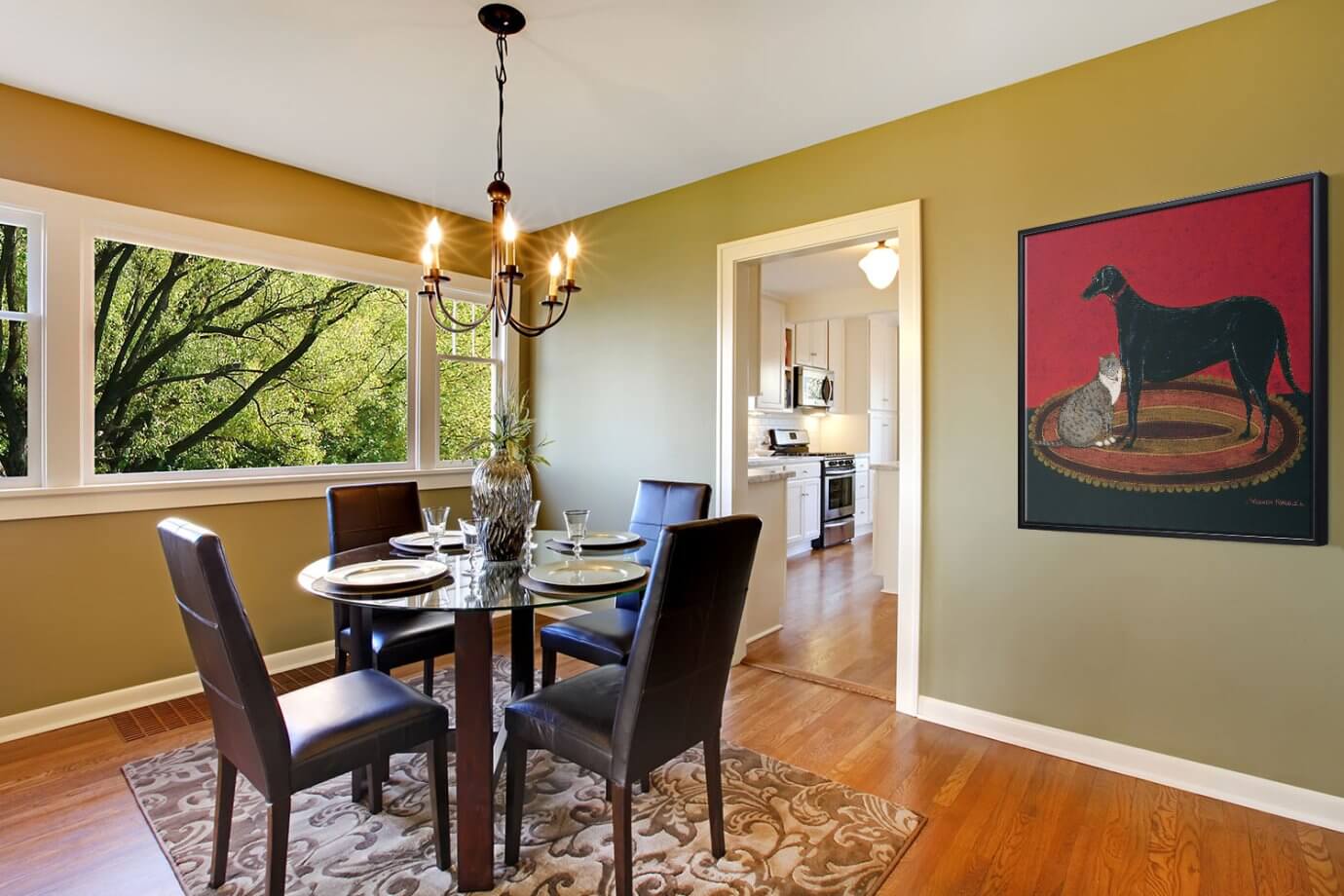 dog and cat art in dining room