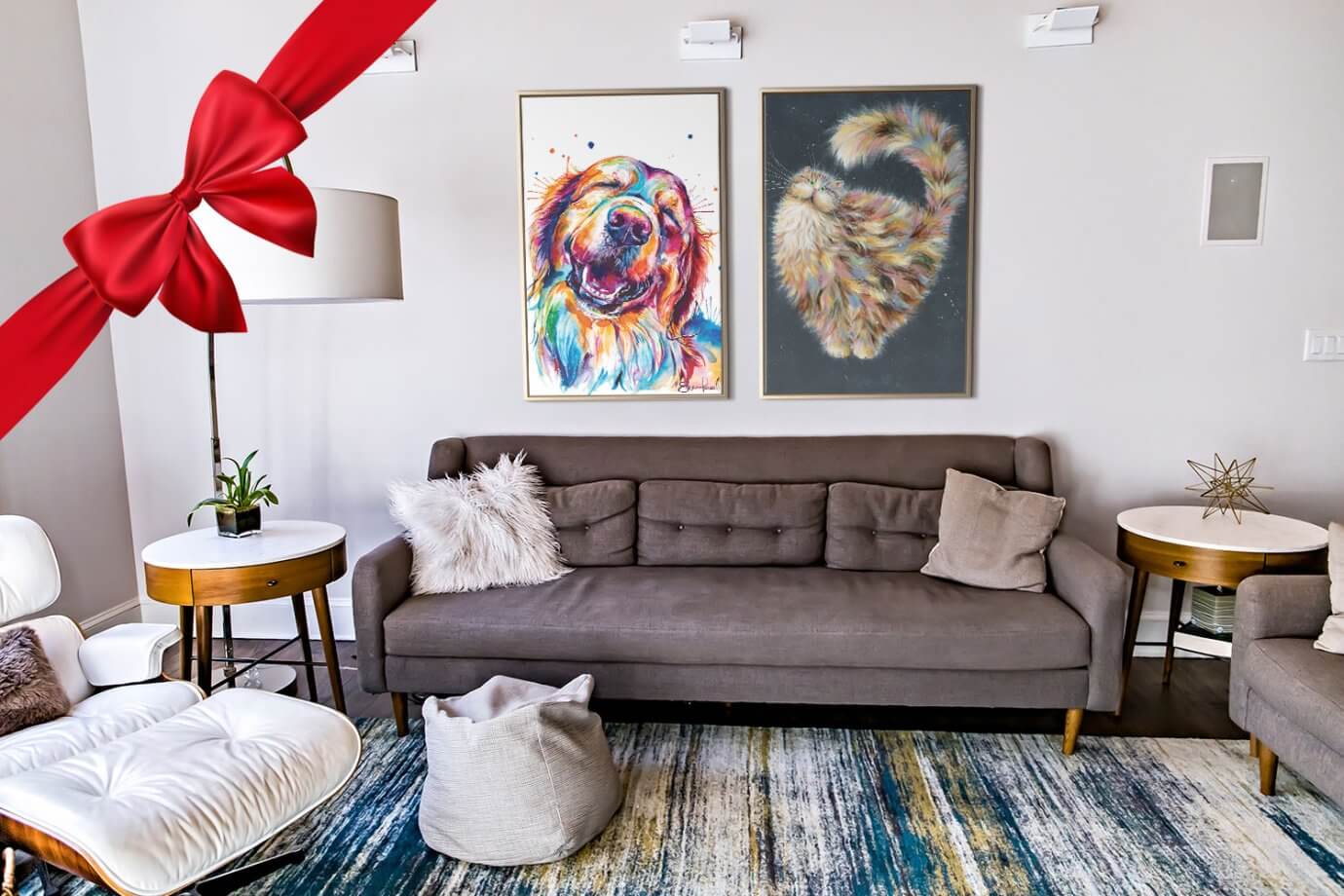 dog and cat art above couch