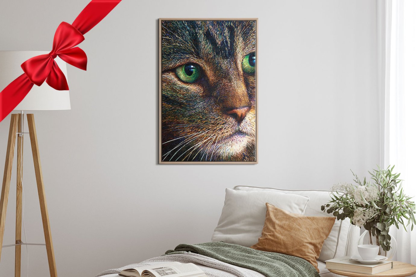 artwork of tabby cat with green eyes hanging on wall