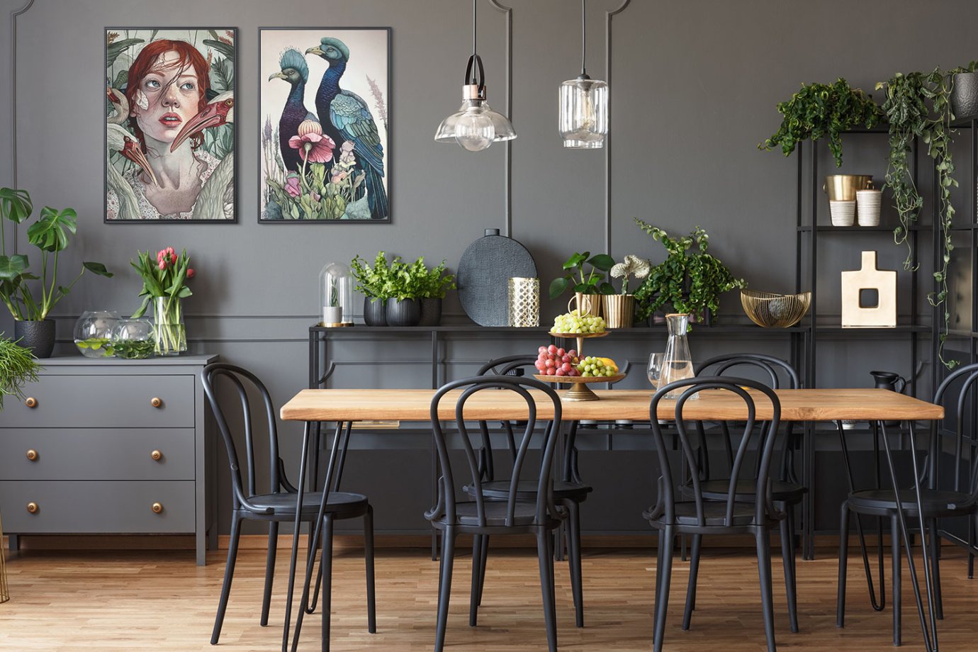 portrait and bird art in kitchen