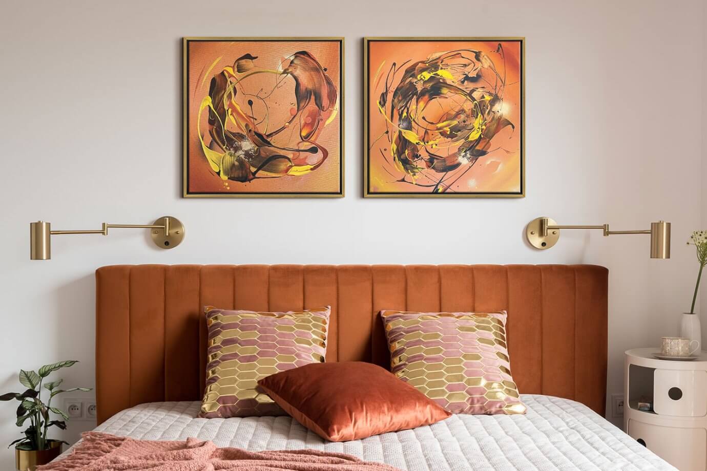 colorful abstract art above the bed