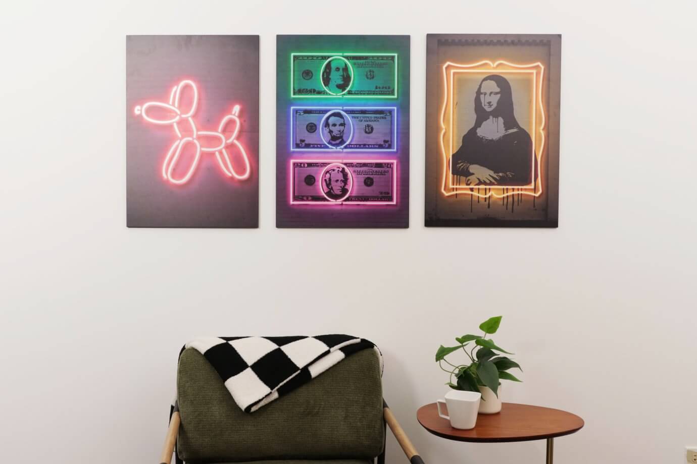 neon artwork above couch