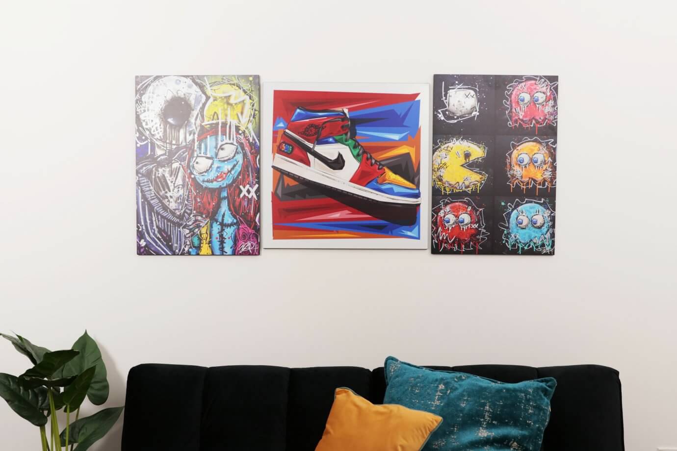 shoe and video game artwork above couch